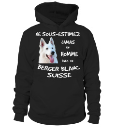 UN HOMME AVEC UN BERGER BLANC SUISSE