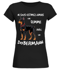 UNE FEMME AVEC UN DOBERMANN