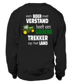 Groene trekker op het land