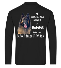 UN HOMME AVEC UN BERGER BELGE TERVUREN